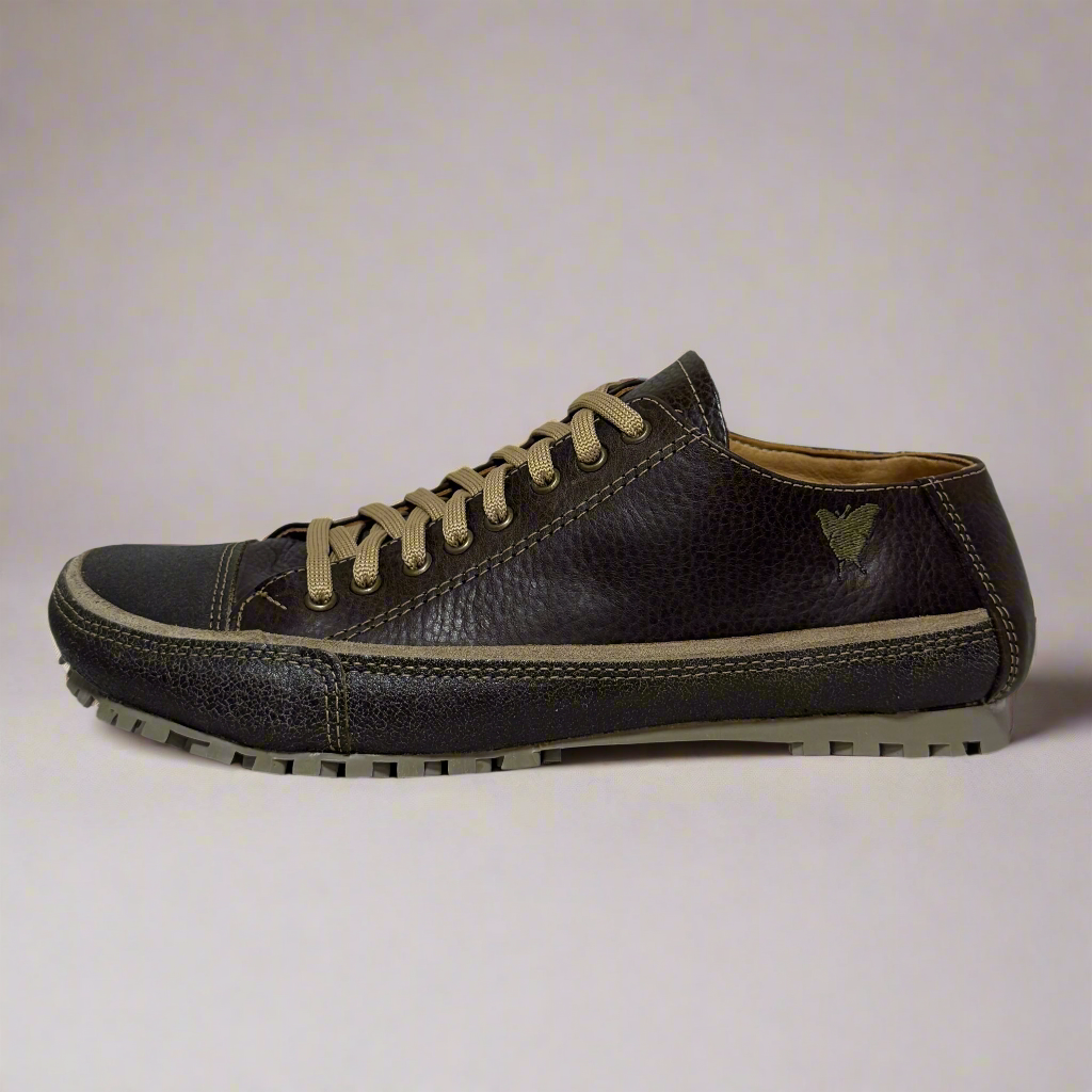 Brown leather sneaker with beige laces on a white background