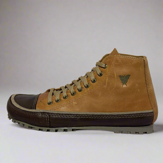 Brown leather boot with a visible brand logo on a white background