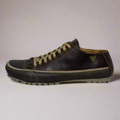 Brown leather sneaker with beige laces on a white background