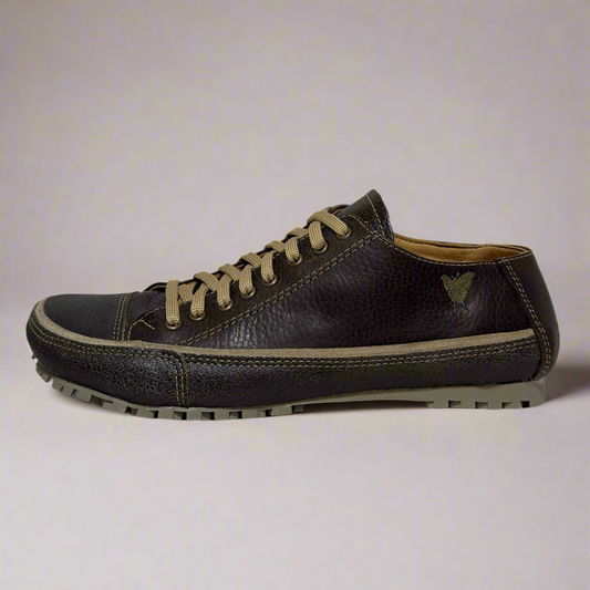 Brown leather sneaker with beige laces on a white background