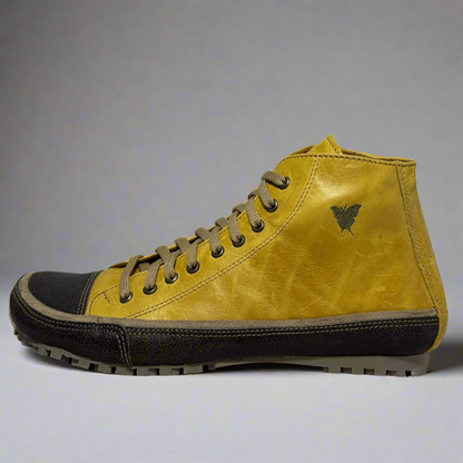 Yellow high-top sneaker with black sole on a white background